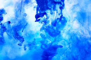 Beautiful ink mix macro. Sky blue, shiny, white and aquamarine colors oil paint pouring. Moving and...
