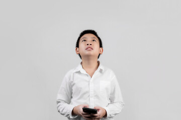 Asian boys studio portrait on gray background