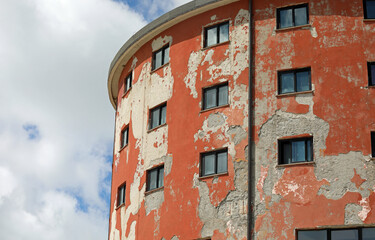 old abandoned building with the wall peeling due to lack of maintenance