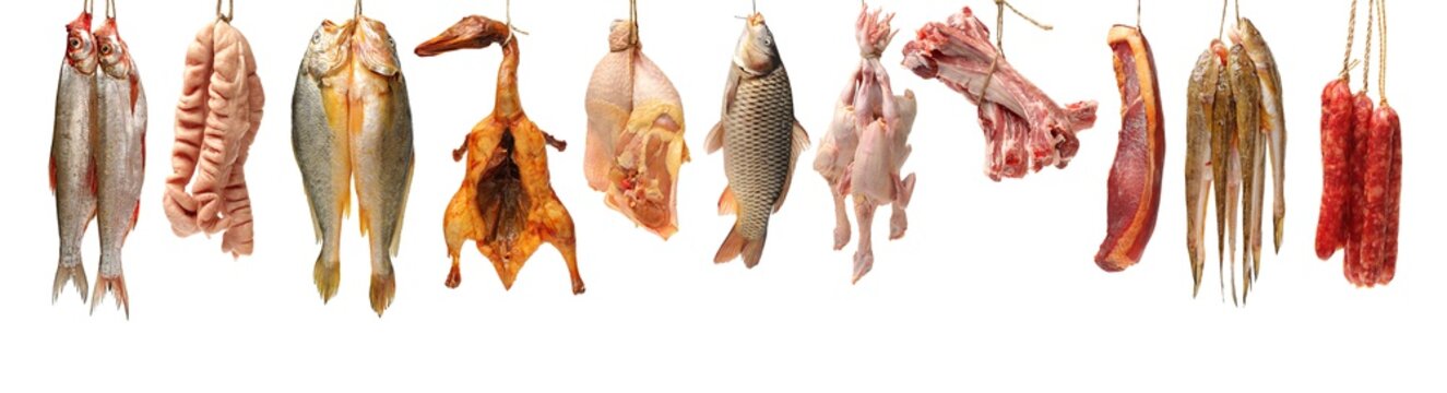 Raw fish carp,spare ribs and raw hen on white background 