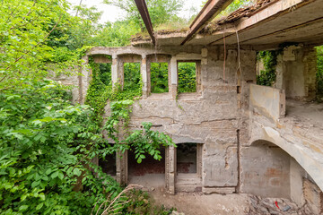 Fototapeta na wymiar Aleksa Santic, Serbia - June 06, 2021: The abandoned Fernbach Castle, also known as Baba Pusta, was built in 1906 by Karol Fernbach for his own needs.