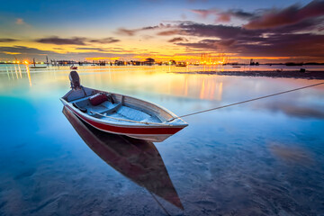 Fisherman boat in beauty sunset  at Batam island 