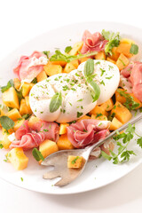 summer salad with melon, prosciutto ham and mozzarella