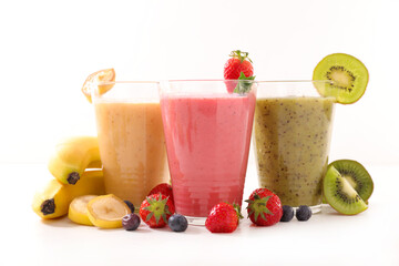 glasses of fruit smoothie on white background