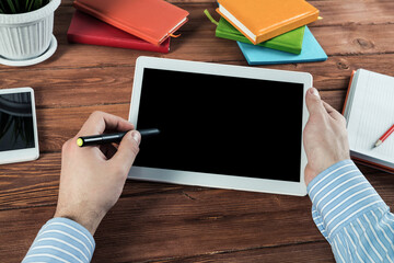 businessman with a tablet, works in the office