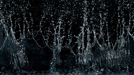 Plakat Abstract water splashes isolated on black background