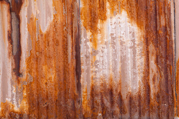 Close up of rusty corrugated iron wall in the abandoned historic Santa Laura saltpeter plant in the north of Chile