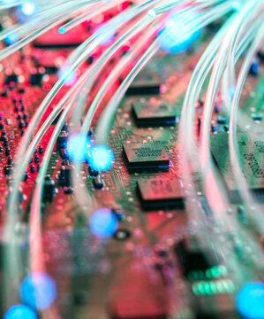 UK, Bucks, High Wycombe, Optical fibers on mother board