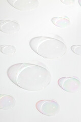 A hemisphere of a transparent soap bubbles on white background with trendy shadows. 