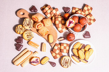 Assorted various cookies and muffins