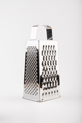 Shiny stainless steel cheese grater