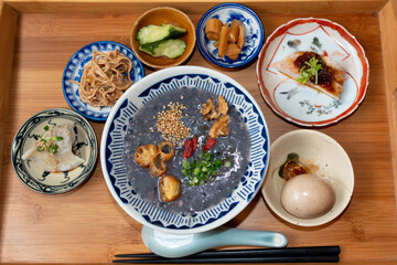 Taiwanese porridge with side dishes at a restaurant in Japan