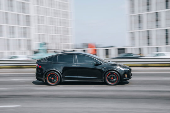 Ukraine, Kyiv - 29 April 2021: Black TESLA Model X car moving on the street. Editorial