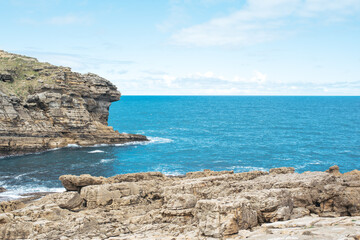 Fototapeta na wymiar waving ocean from rocky cliff