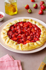 Strawberry galette or open pie . Baking. Vegetarian food.