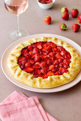 Strawberry galette or open pie . Baking. Vegetarian food.