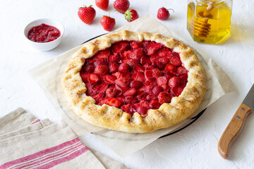 Strawberry galette or open pie . Baking. Vegetarian food.