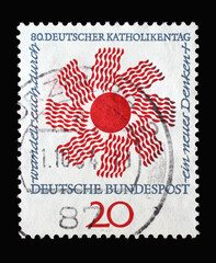Stamp printed in Germany showing a stylized sun with inscription: walk through a new way of...