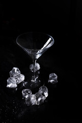 Cocktail on black background. Cocktail at the bar. Alcoholic drink at the night club.