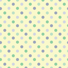 Colorful green blue grey dots on light yellow repeat seamless pattern design