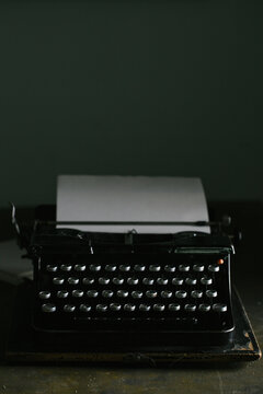 Vintage typewriter on wooden table