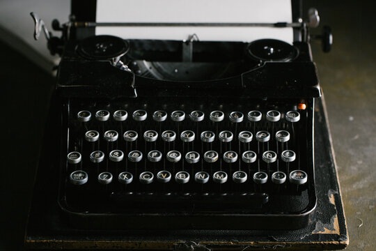 Vintage typewriter on wooden table