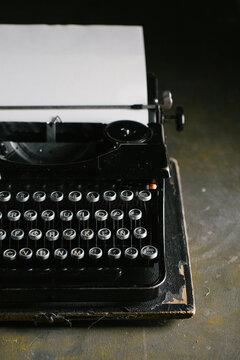 Vintage typewriter on wooden table