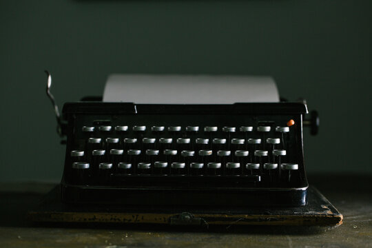 Vintage typewriter on wooden table