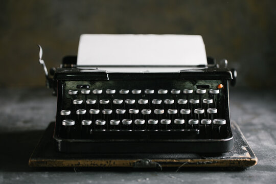 Vintage typewriter on wooden table