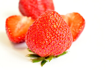 Ripe berries. Strawberries, several berries, lie on a white table.