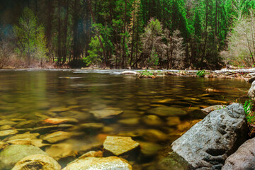 Amazing mountain landscape with waterfall and river view, photographed on a long exposure in the afternoon, Yosemite National Park