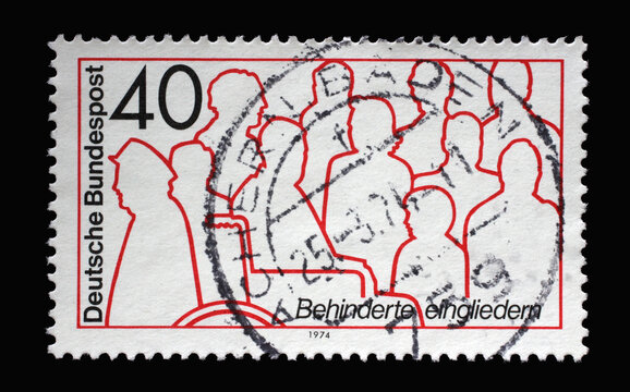 A stamp printed in Germany shows Reintegration handicapped people, circa 1974