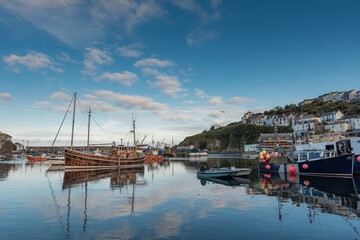 Fototapeta na wymiar Boats in Mevagissey Harbour, Cornwall