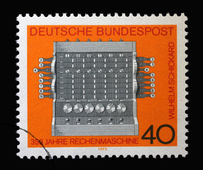 A stamp printed in Germany shows Schickard's Calculating Machine, 350th anniv. of the calculator...