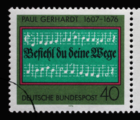 A stamp printed in Germany shows Opening lines of Hymn 