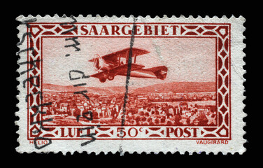 Stamp from Germany area Saar shows Plane over Saarbrucken, circa 1928