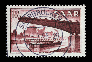 Stamp from Germany area Saar shows Bridge building, population survey, circa 1955