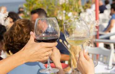 a woman drinking red wine