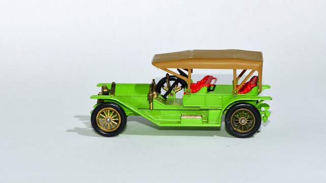 Toy diecast model of a Green 1912 Simplex motor car Y8 a Matchbox yesteryear product by Lesney with white   background