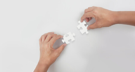 Holds in hand  jigsaw puzzle. Business solutions success