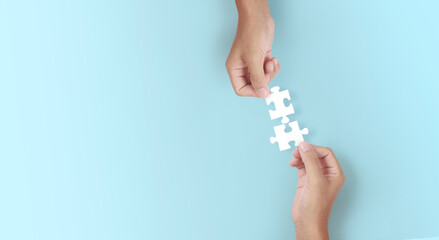 Holds in hand  jigsaw puzzle. Business solutions success