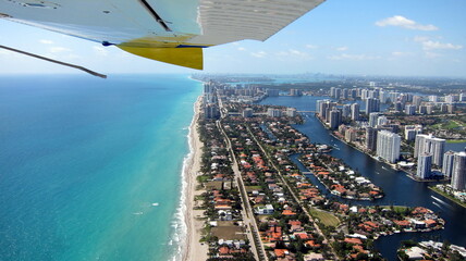 Aerial shot of Miami Beach, Florida and the Atlantic Ocean from a seaplane.