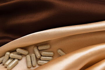 topview of enzymes capsules, with negative space. dietary supplement copyspace. mental wellbeing...