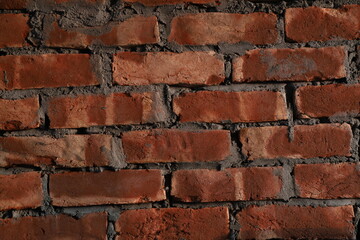 red brick wall of a ordinary under construction building 