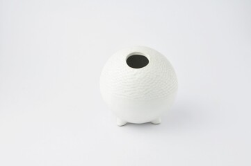 Empty vase for white round flowers isolated on white background.