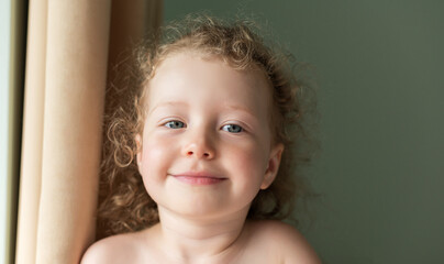 Close-up portrait of a little girl. Baby girl.