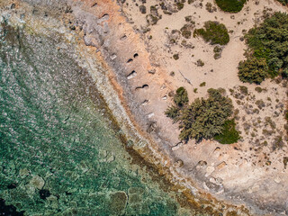 Fototapeta na wymiar Iconic aerial view over the oldest submerged lost city of Pavlopetri in Laconia, Greece. About 5,000 years old Pavlipetri is the oldest city in the Mediterranean sea