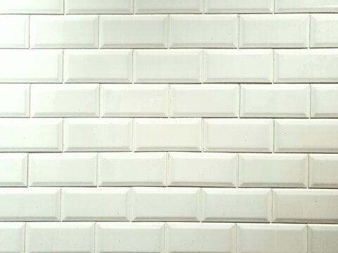 White wall tiles. White wall tunnel. Kitchen stove. White ceramic. White ceramic background. © Elena