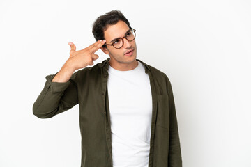 Caucasian handsome man over isolated white background with problems making suicide gesture