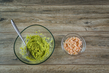 Guacamole. Green appetizer with avocado, egg and krill. 
Making Avocado Shrimp Sauce